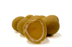 Macadamia Nuts tumbled in Ginger Milk Chocolate